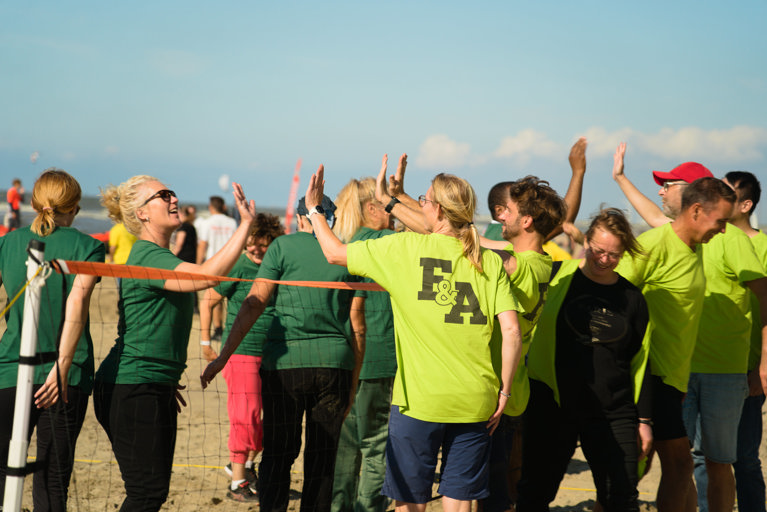 Teva Harlem employees highfiving after a match