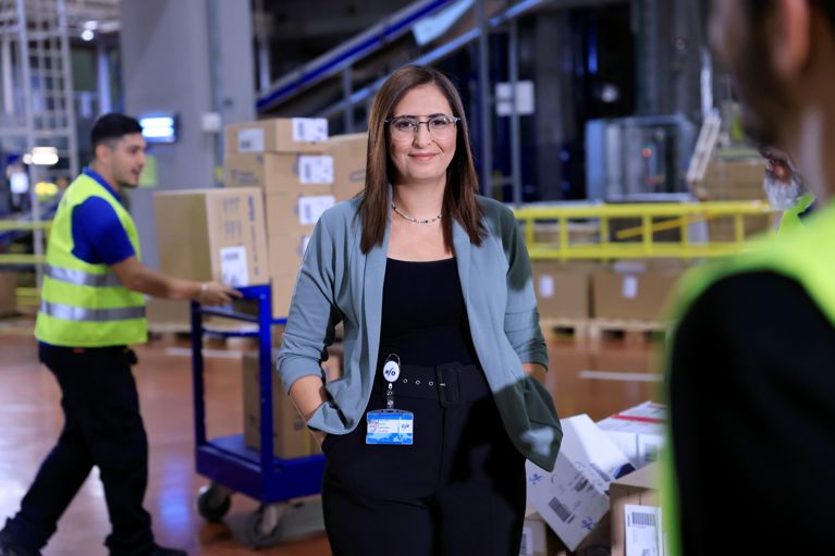 a woman in a warehouse