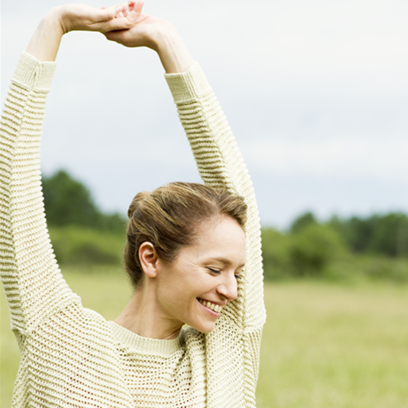woman-happy-stretching-hands-up